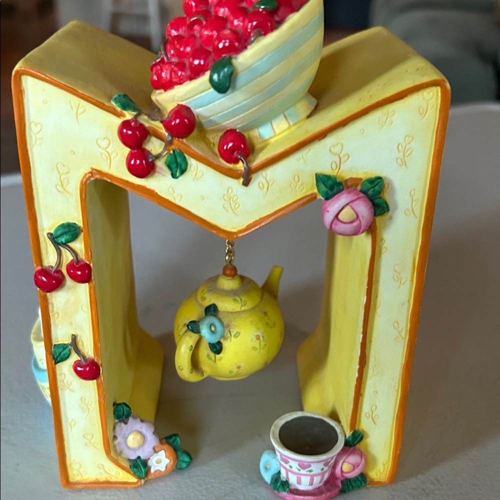 Mary Engelbreit Tea Cup Cherry “M”.